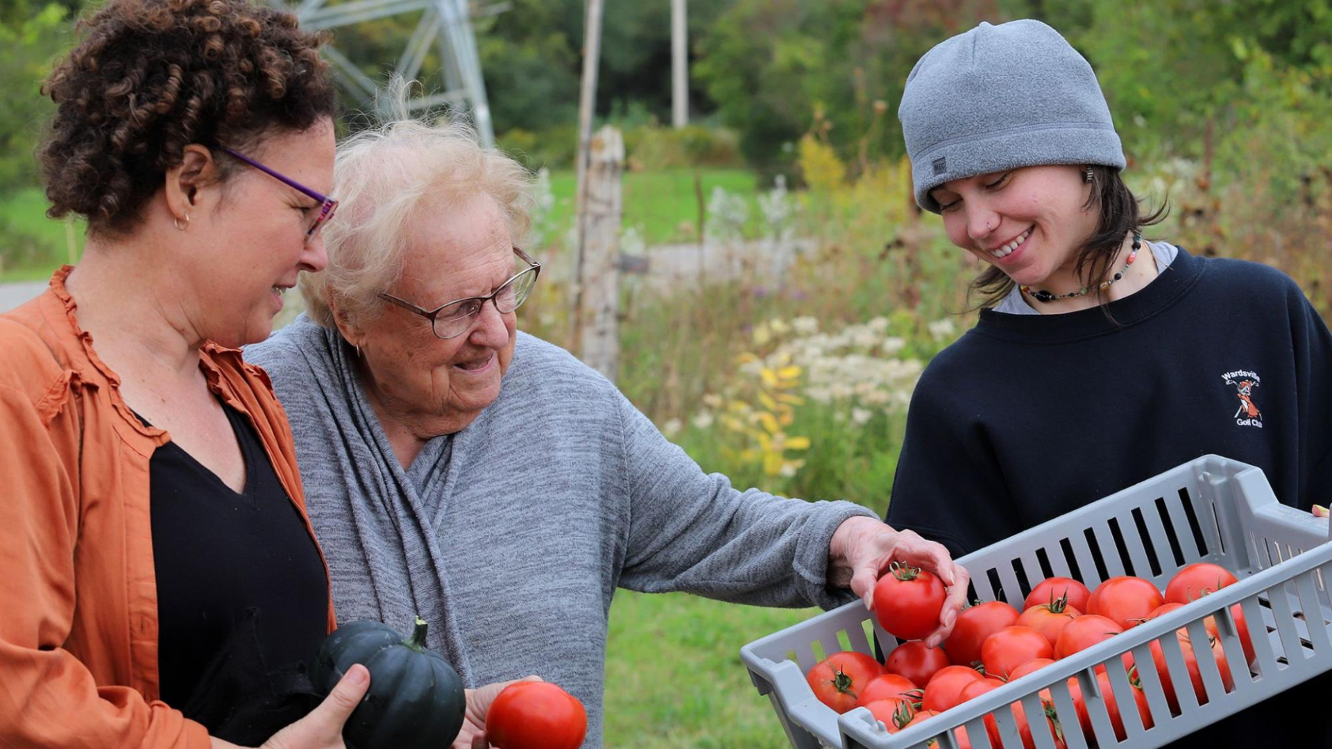 Photo of Urban Roots customers selecting produce