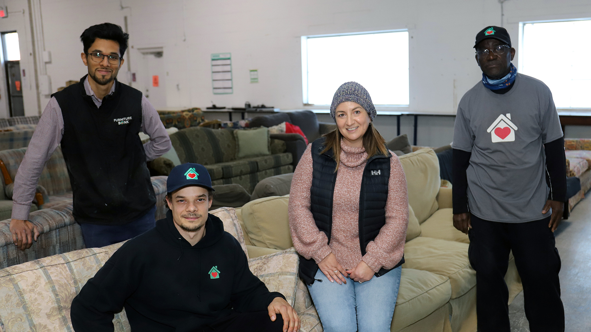 Furniture Bank employees Jean-Christophe Foolchand, Jordan Shears, Tammy Peddle, and Serge Brazard.