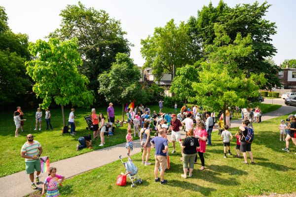 Residents gather for a 2SLGBTQ+ celebration in a park in Toronto’s east end. (East End Kids Pride Parade/Supplied)