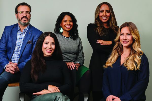 Jehad Aliweiwi, executive director of the Laidlaw Foundation (top row, left) with his colleagues in Toronto, Ont. The foundation was the top family foundation in a new equitable funders ranking. (Duane Cole/Supplied)