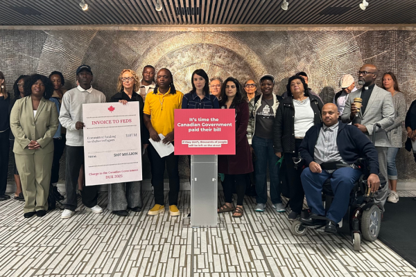 Representatives of Toronto’s refugee-serving organizations, shelters and advocacy groups gathered at City Hall on Sep. 29 to raise the alarm about cuts to the federal government’s Interim Housing Assistance Program (IHAP) (Sharlene Gandhi / Future of Good)