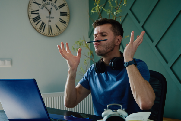Healthy remote workplace cultures trust their employees to get their work done and encourage wellness and exercise breaks – even if that exercise is perfecting your pencil-balancing-on-your-face skills. (Canva/Supplied photo.)